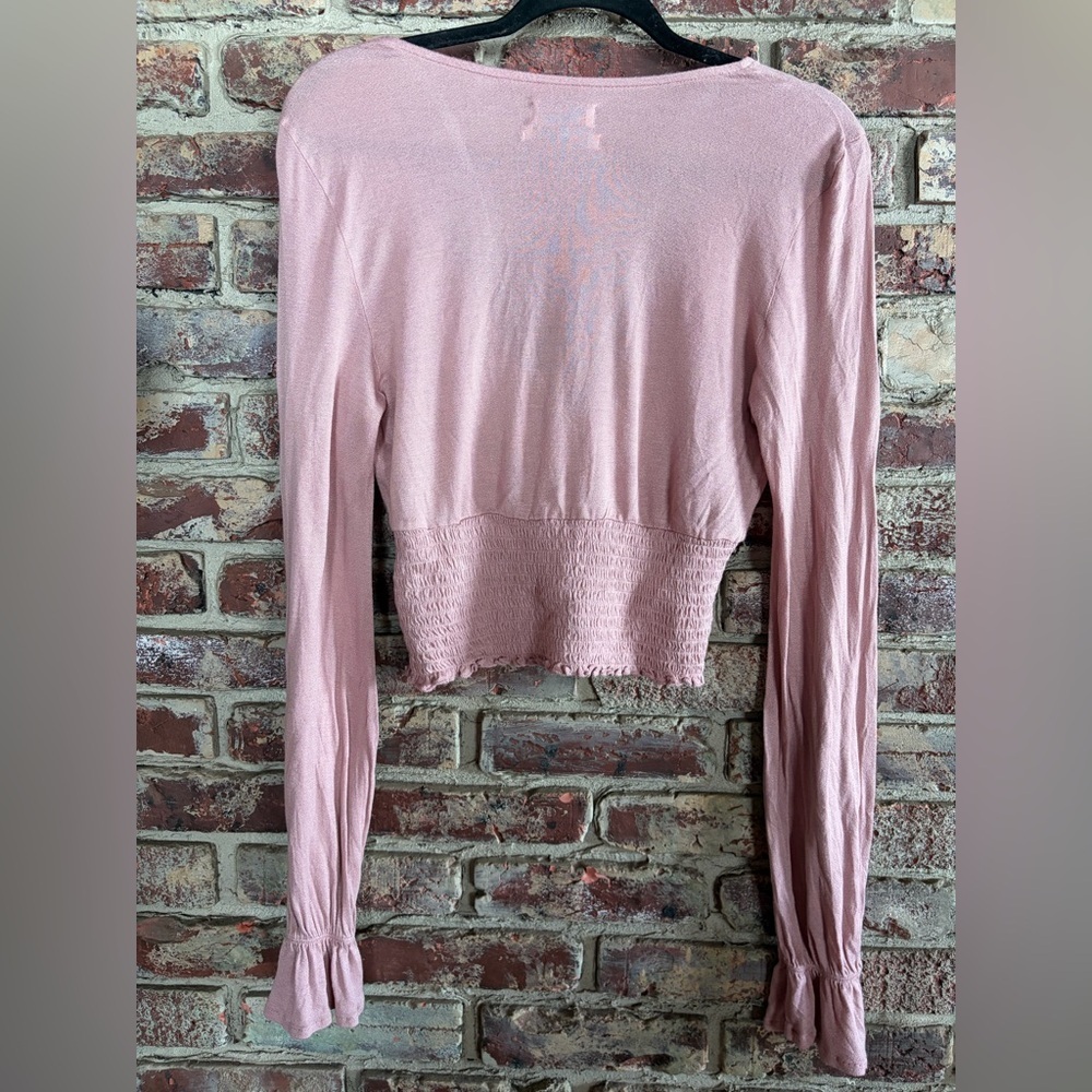 Sold - Similar Items in Closet!
Urban Outfitters Pink Surplice Crop Top - Picture 5 of 5